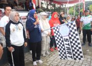 Hardiknas 2026 di Parimo Diawali Jalan Santai, Kadis Pendidikan Dorong Transformasi Pendidikan Digital